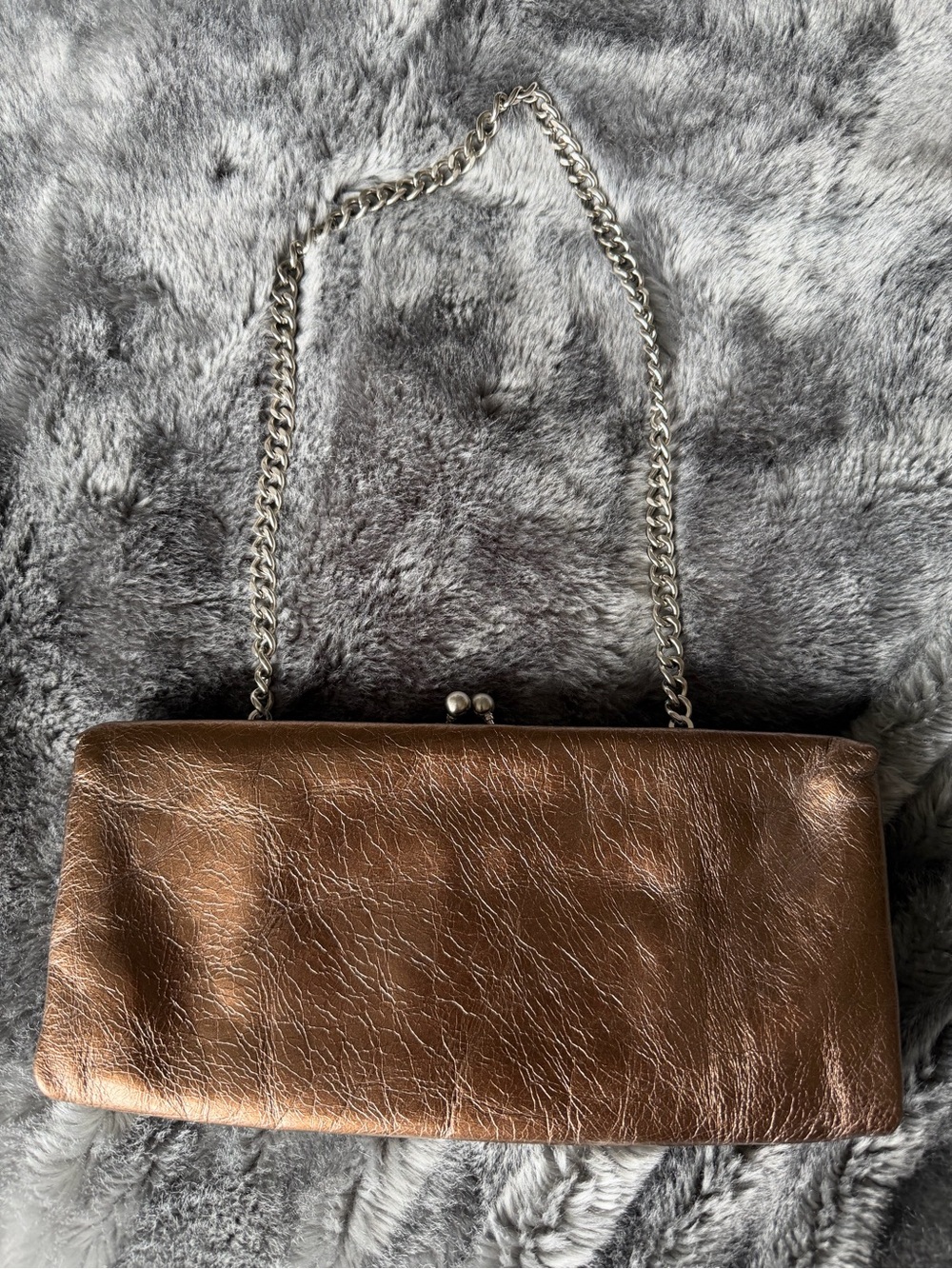 Hobo International bronze convertible clutch